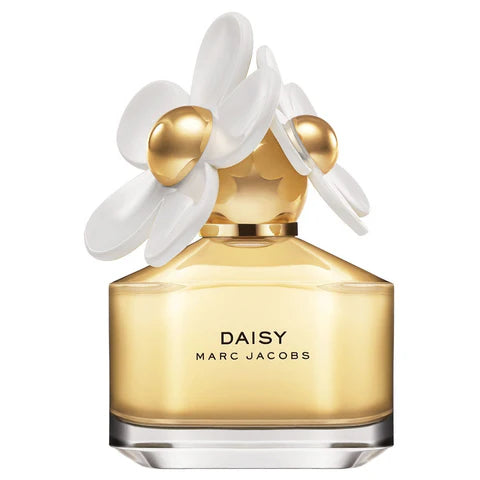 Gold Marc Jacobs Daisy perfume bottle with white flowers on a white background
