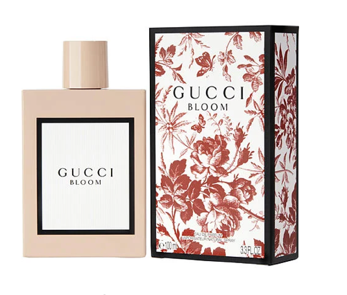 Gucci Bloom perfume bottle and packaging on a white background