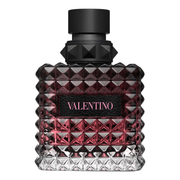 Valentino perfume bottle with black cap and red and clear diamond-patterned design on a white background
